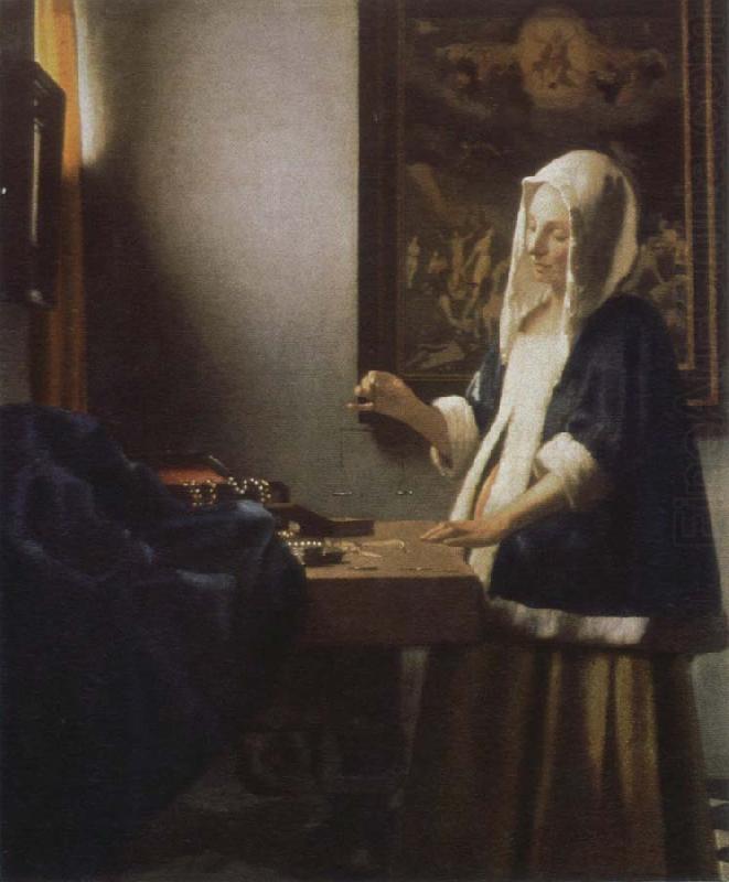 woman holding a balance, Jan Vermeer